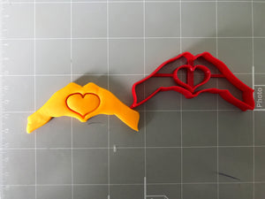 Hand making Hearts Cookies Cutter